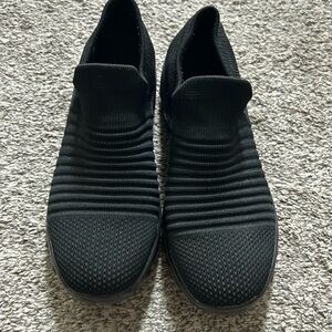 Women’s black sock shoe. Size 8. Excellent condition. Very comfortable.